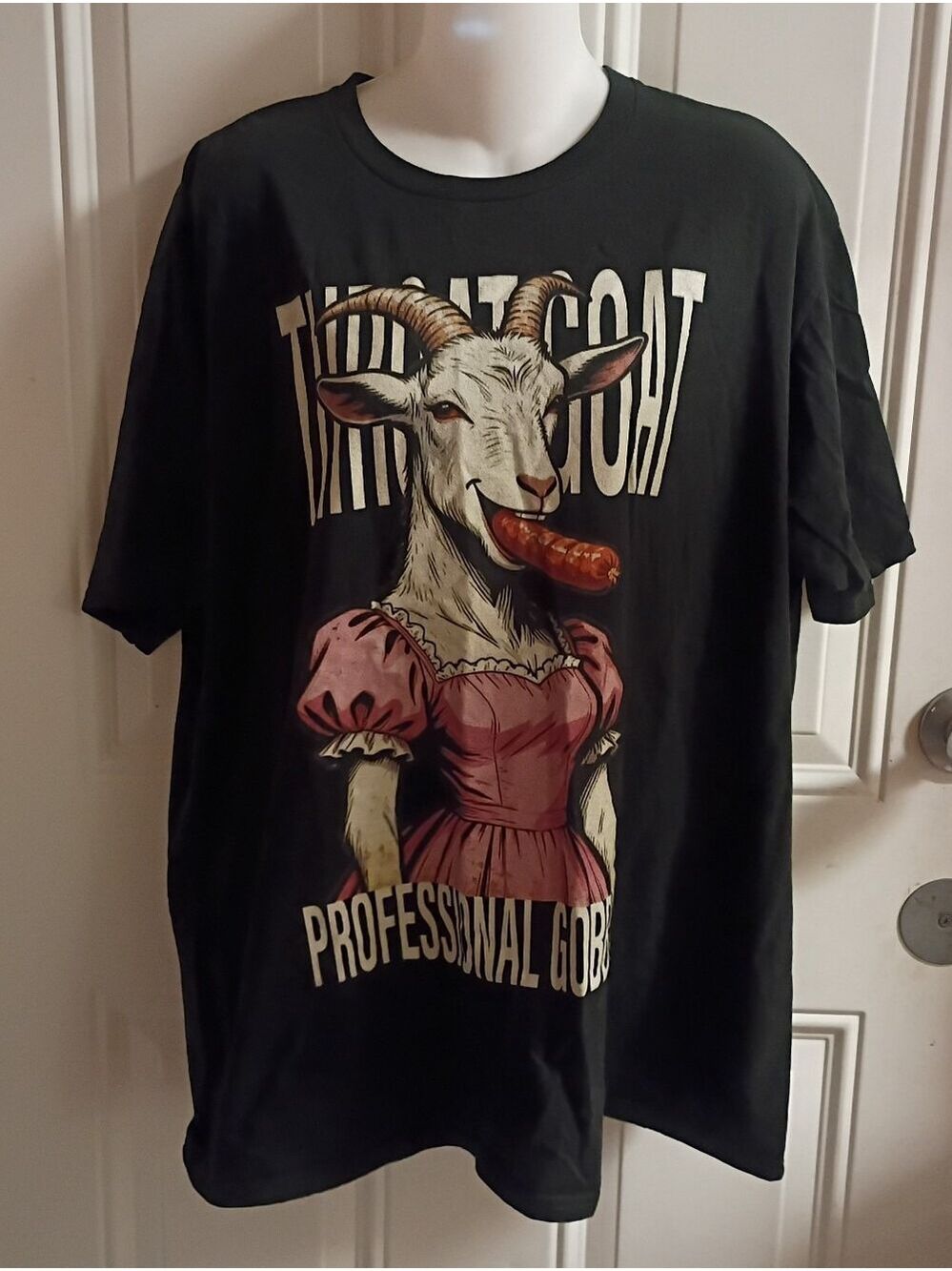 Black Graphic Tee with Goat Illustration and Pink Dress